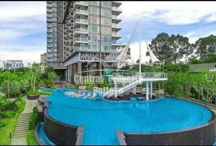 Luxury Beachfront High-Rise Condominium in Bangsaray Offering Panoramic Sea Views and Resort-Style Facilities.